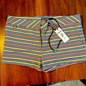 Never worn, tag still on, MR TURK bathing suit. Size 33. Original price $228